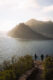 View over Hout Bay from Chatmans Peak viewpoint with crew admiring the view