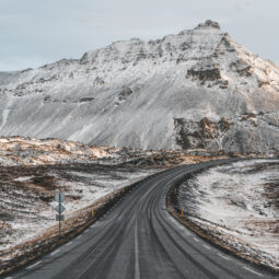 First rays of sunlight on a road on the Snæfellsnes peninsula
