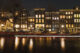 Typical Amsterdam canal view at night